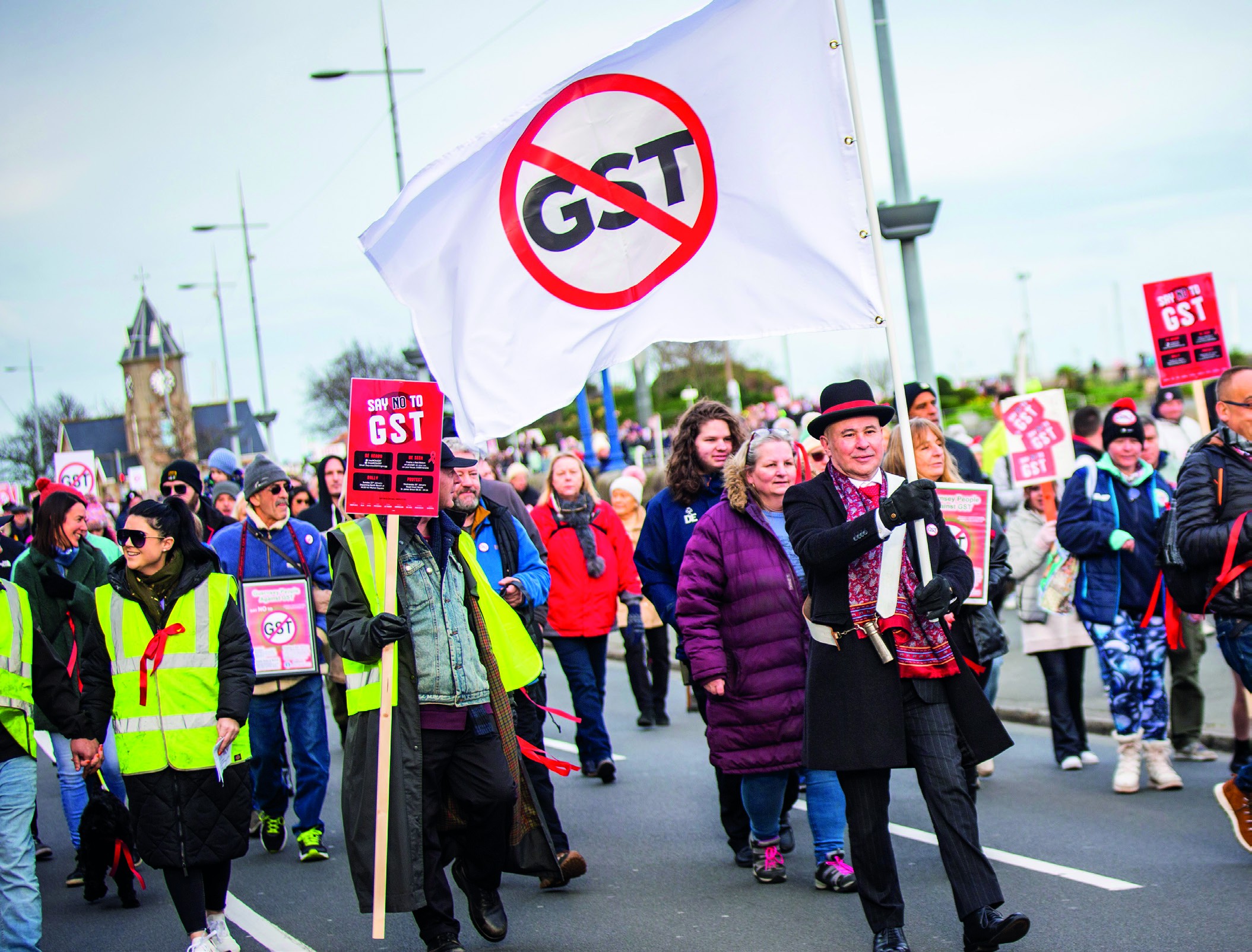 Carl Meerveld leading the anti-GST Red Ribbon march through St Peter Port, January 2023